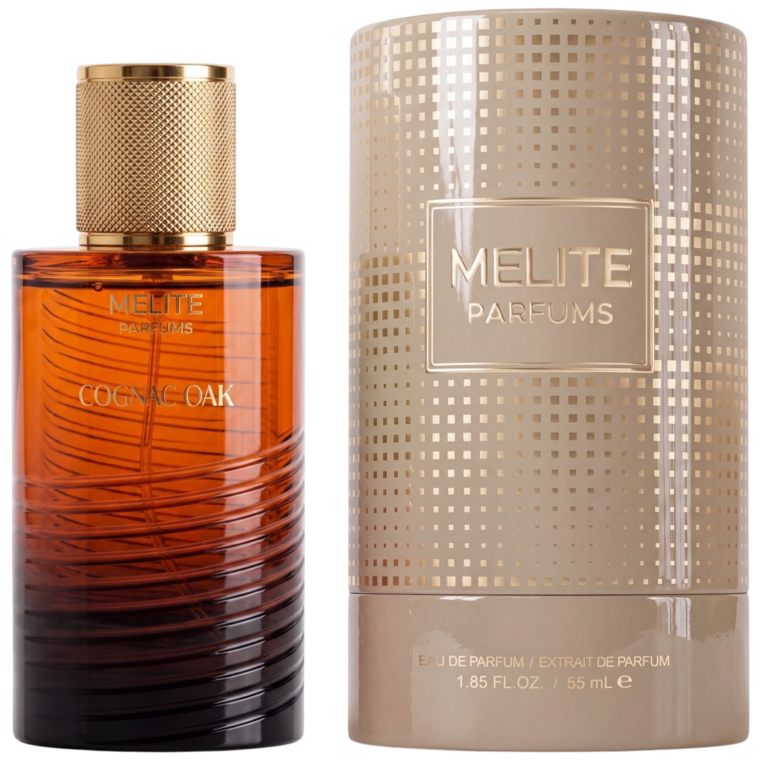 MELITE PARFUMS Cognac Oak 55ml unisex extrait de parfum bottle with gold cap next to its matching cylindrical box.