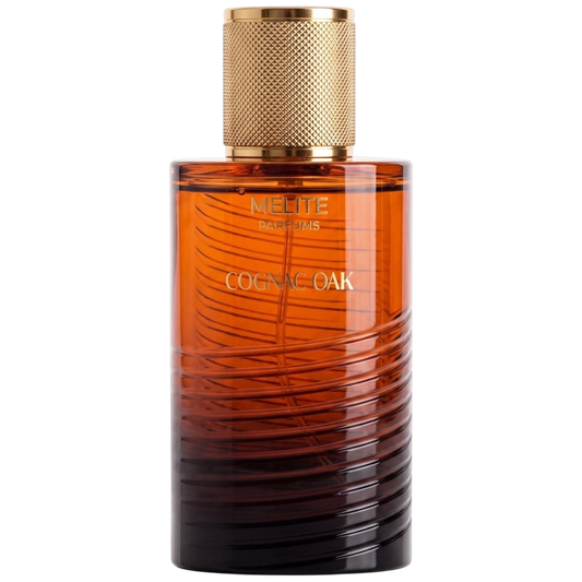 MELITE PARFUMS Cognac Oak unisex extrait de parfum in a sleek amber glass bottle with a textured gold cap.
