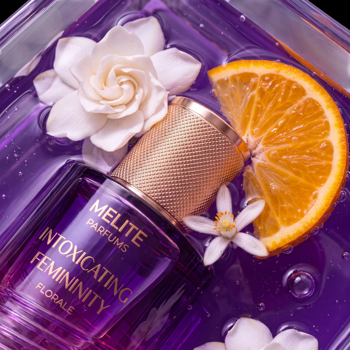 MELITE PARFUMS Intoxicating Femininity Florale perfume bottle in purple liquid with gardenia flowers and orange slice