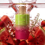 MELITE PARFUMS Intoxicating Femininity EDP bottle in water with watermelon, strawberries, and lily of the valley