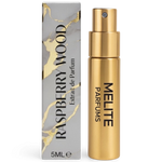 MELITE PARFUMS Raspberry Wood extrait de parfum 5ml travel spray with a gold bottle and marble-patterned box.