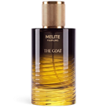 MELITE PARFUMS The Goat unisex eau de parfum in a glass bottle with a gold textured cap and amber gradient design.